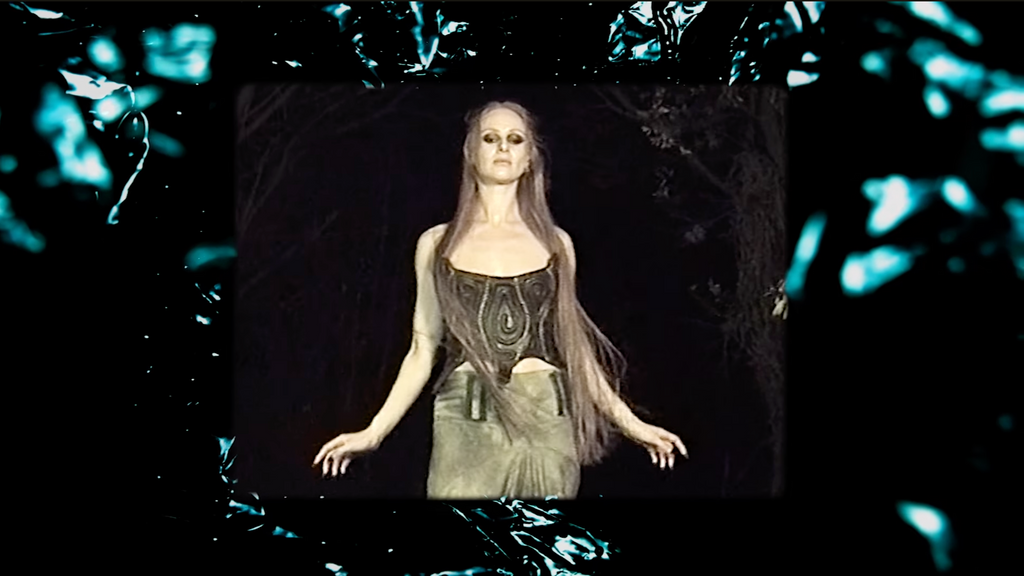 Digital art of a woman with long hair and dark clothing against a black background with blue accents.