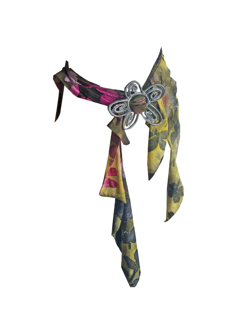 multi wear top or skirt or belt with a floral metal belt buckle on a white background