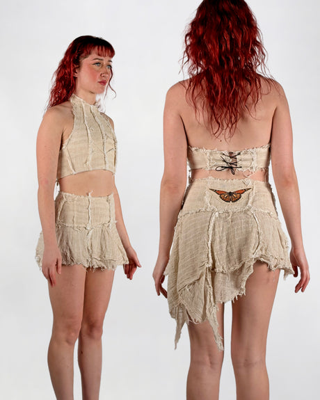 Woman wearing a beige crop top and skirt with frayed details, front and back views on a white background.