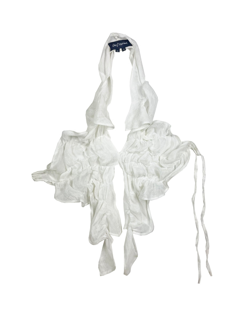 White ruffled linen halter tie up top with a cakey sportsman label on a white background