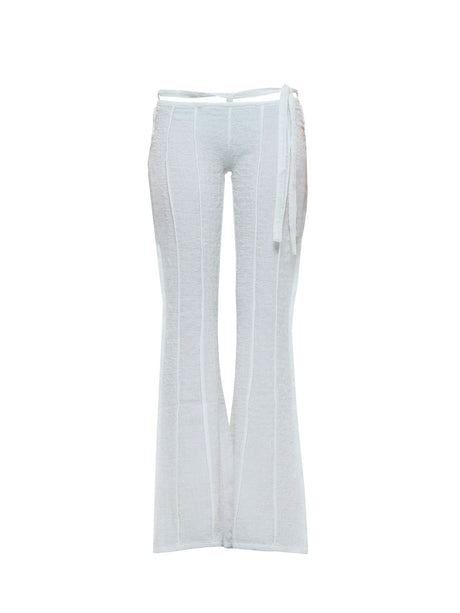 White flared pants with attached and suspended white fabric belt on a white background